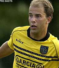 NAC Breda breekt contract Slot open