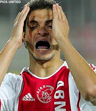 Vijfde spits Charisteas mag weg bij Ajax