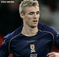 Manchester United staat Fletcher af aan Schotland