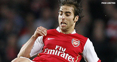 AC Milan lijft Arsenals Flamini transfervrij in