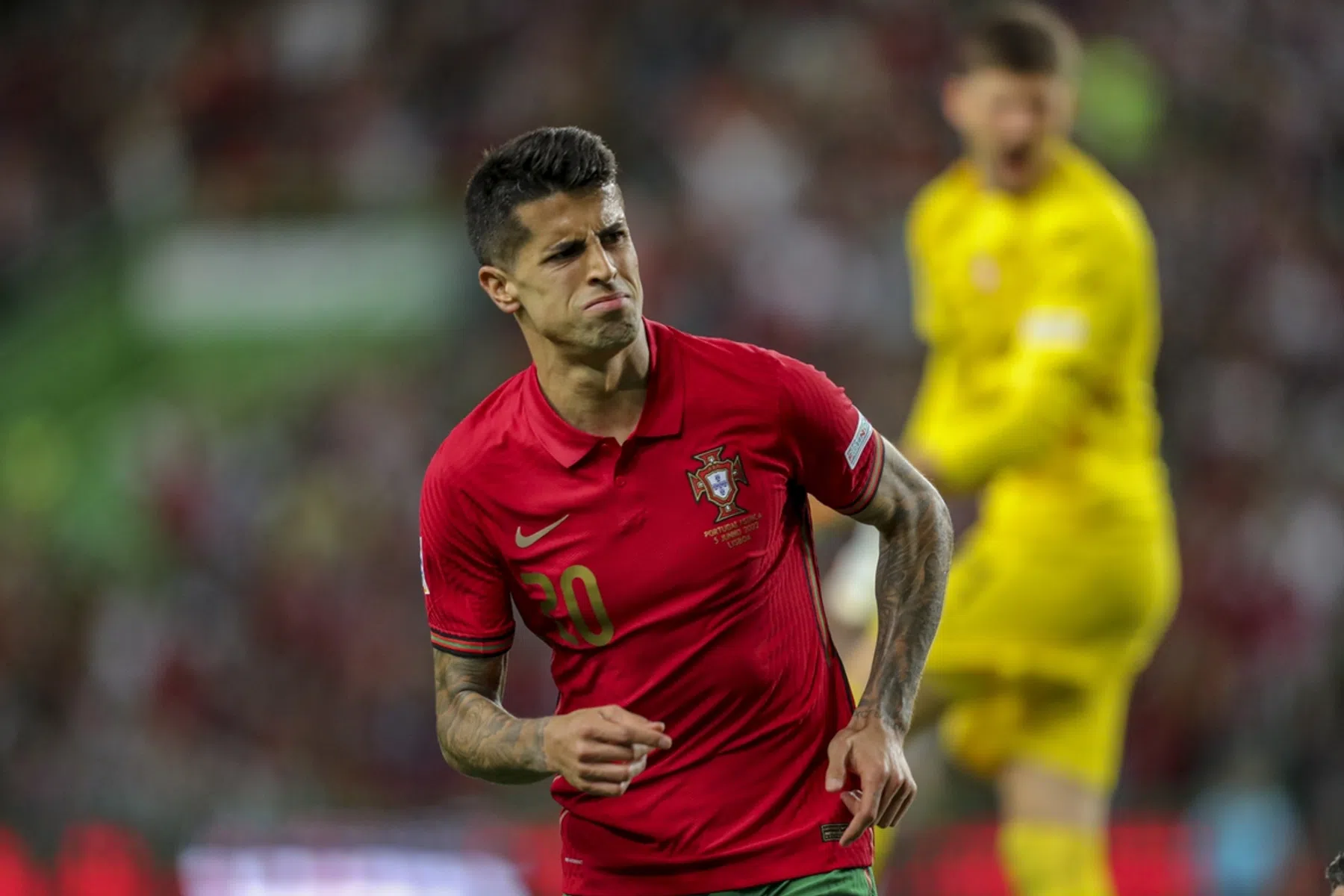 Portugal blijft koploper na knal Cancelo, Gavi leidt Spanje naar eerste zege
